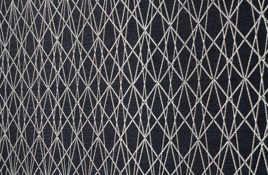 Detailný záber na odolnú polyesterovú tkaninu, ktorú možno aplikovať aj do zaťažovaných priestorov či do kúpeľní, Zdroj: dekre.cz
